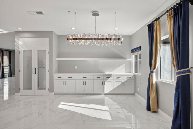 Building Photo - Modern Elegance Meets Scenic Privacy in Be...