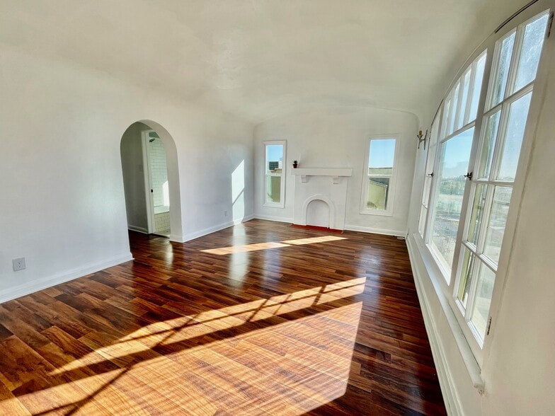 Faux Fireplace with views of DTLA skyline through window - 1306 Montana St