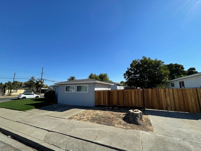 Building Photo - Huge yard with 4 car garage! Newly Remodel...