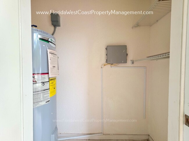 Building Photo - MOVE IN READY! LARGE 2 BEDROOM/2 BATH PLUS ATTACHED GARAGE! TILE/LVP THROUGHOUT!