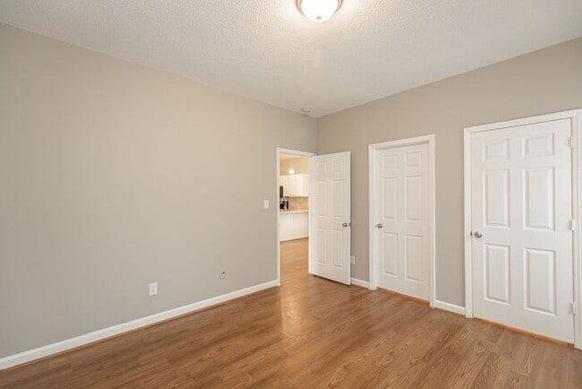 Building Photo - Like New Home off Freeman Mill. Just Painted, New Wood/Vinyl Flooring, Vaulted Ceilings, Front Po...