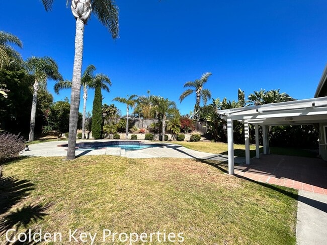 Building Photo - Welcome to this stunning 4-bedroom, 2.5-ba...