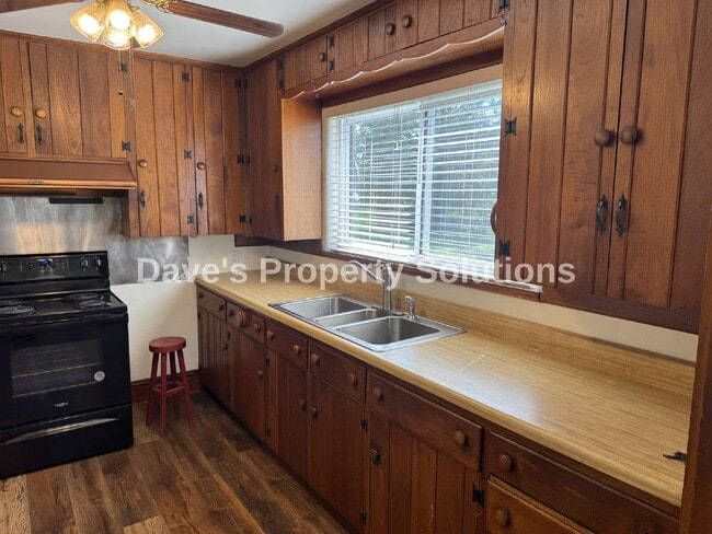 Building Photo - Spacious Living on ~1 Acre! | 3-Car Garage + Extra Covered Parking | Landscaping Included!
