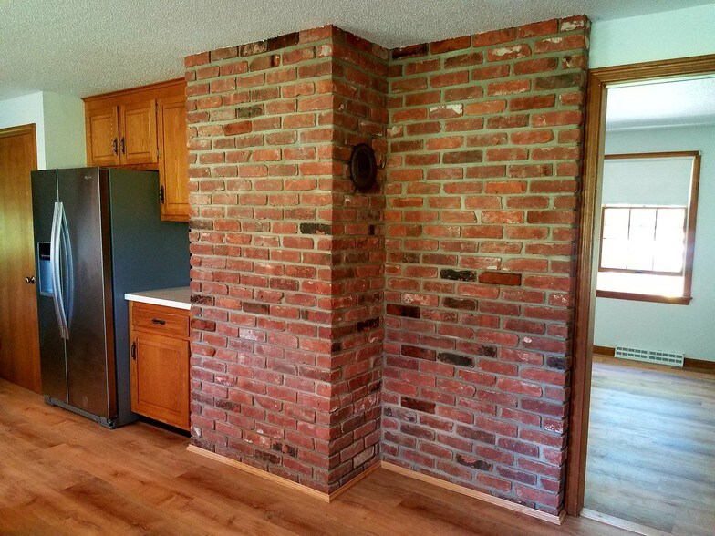 Country kitchen with view into living room - 373 Meadow Rd