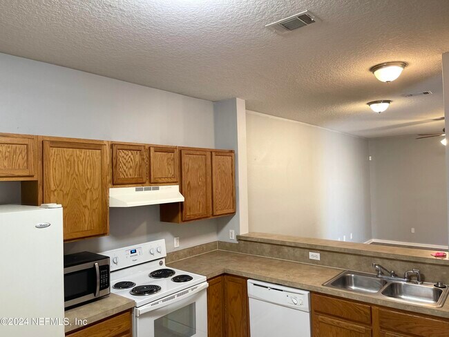 Building Photo - 4734 Playpen Dr