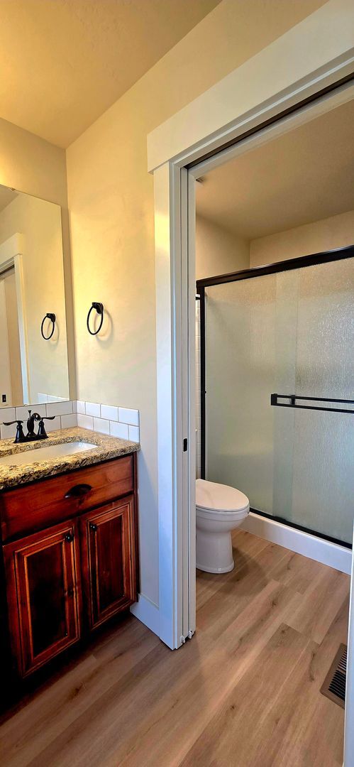 Building Photo - THREE-CAR GARAGE! This charming home offers 3 bedrooms, plus an office/rec room, and 2 bathrooms.