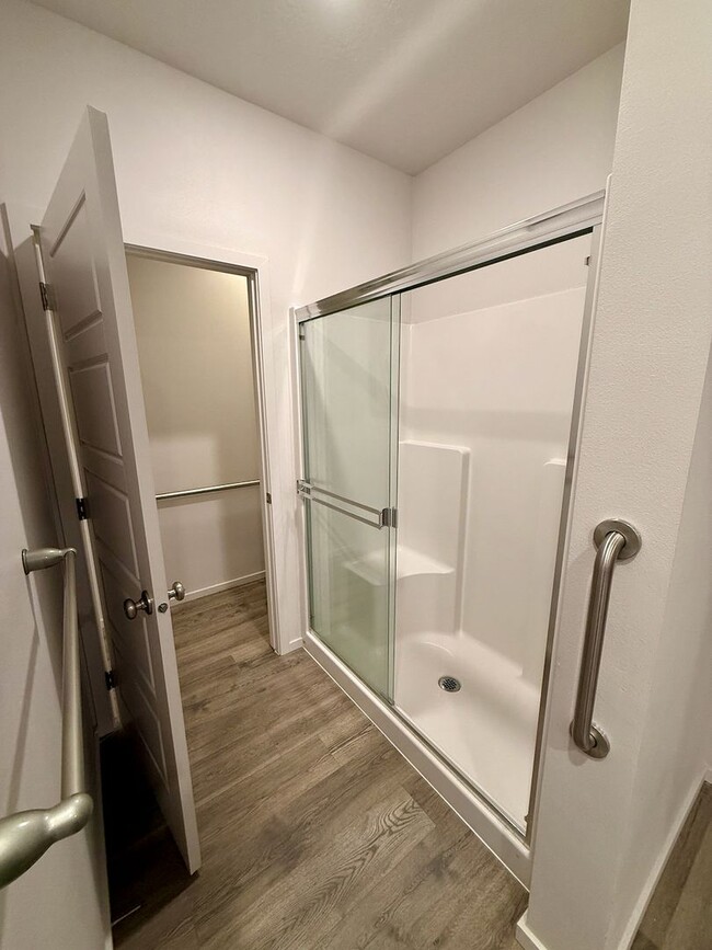 Building Photo - New Construction 4 Bed Mead School District Rancher w/ Fully-Fenced Yard and Attached Garage!