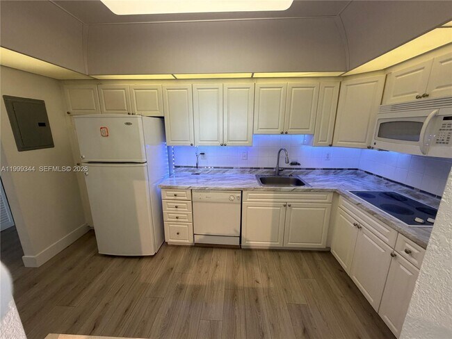 Building Photo - 19380 Collins Ave