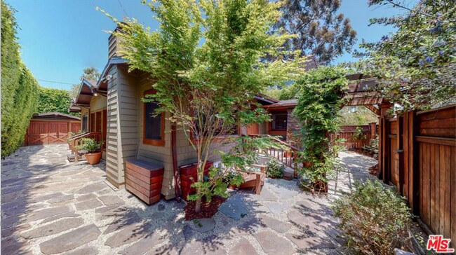 Building Photo - Impeccably restored Craftsman Securely Gated and Hedged for Privacy!