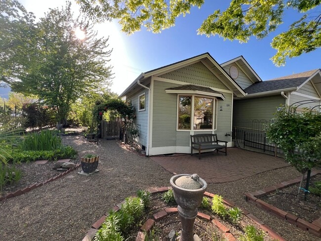 Building Photo - Gardener's Dream!  2 Bedroom house on quiet corner lot