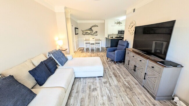 Building Photo - 6-12 month TURNKEY FURNISHED GOUNG FLOOR 2/2 CONDO