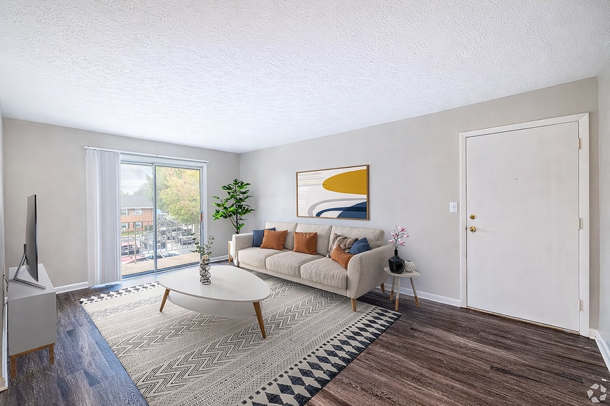 Modern living room with colorful accents - Blue Ridge Apartments