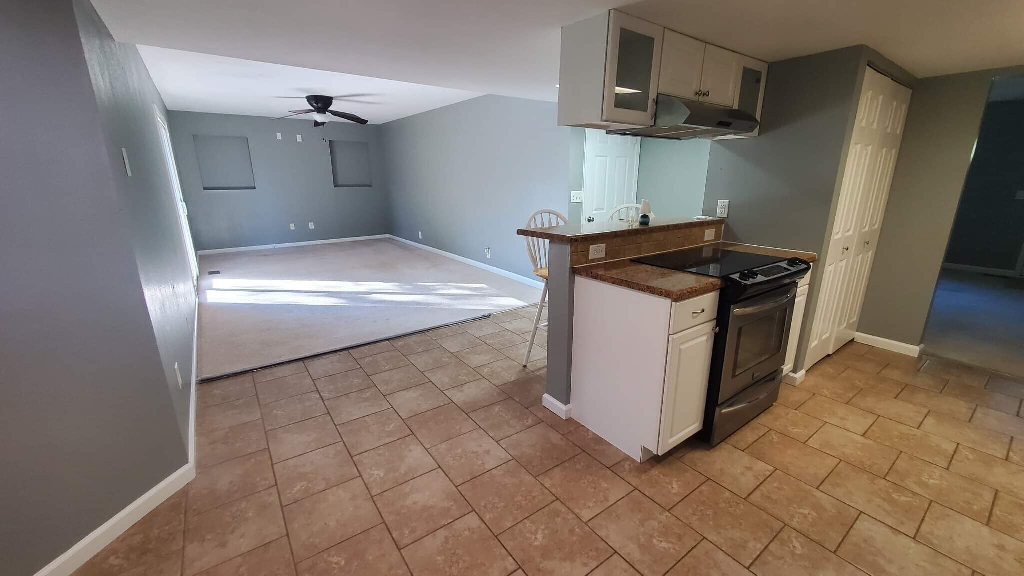 Garage entry seen by barstools. - 313 Britanna Dr