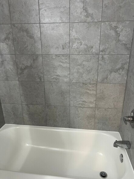 Bathroom- new tile and tub - 3662 Diane Ln