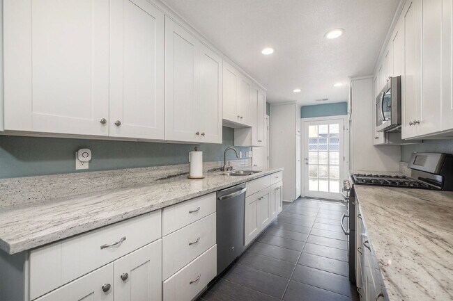 Building Photo - Tamarack Coastal Retreat! 1/2 Duplex with ...