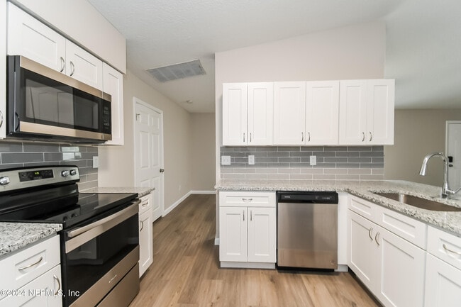 Building Photo - 7263 Eudine Dr N