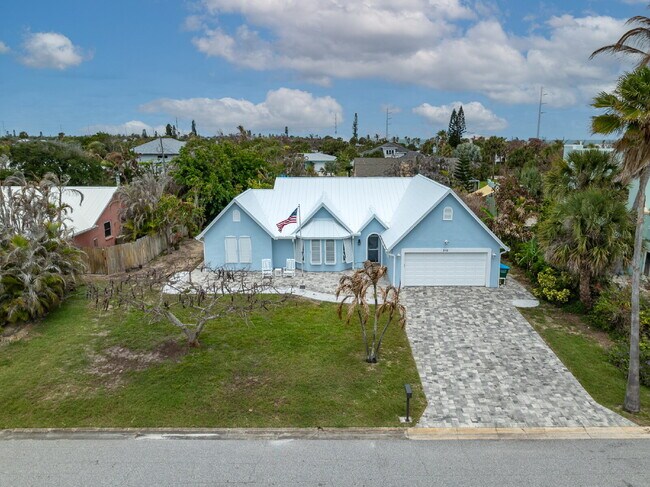 Building Photo - 4BR/2.5BA in gorgeous Melbourne Beach!