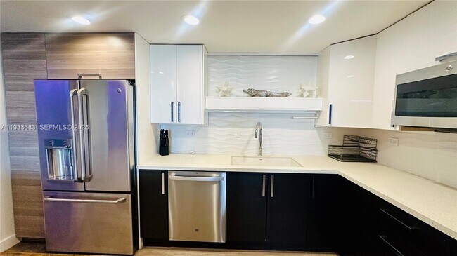 Building Photo - 19390 Collins Ave