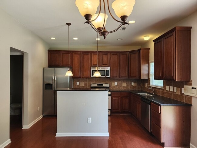 Building Photo - Quaint 4-Bedroom Home