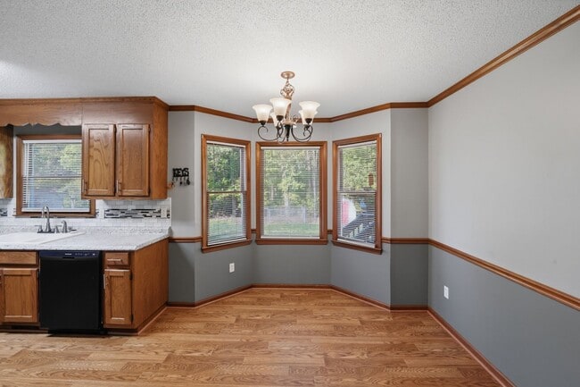 Building Photo - Spacious 4BR with Beautiful Backyard Retreat!