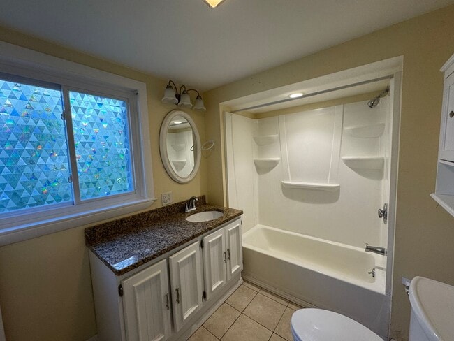 Building Photo - Spacious 4-Bedroom Home with Upgrades and ...