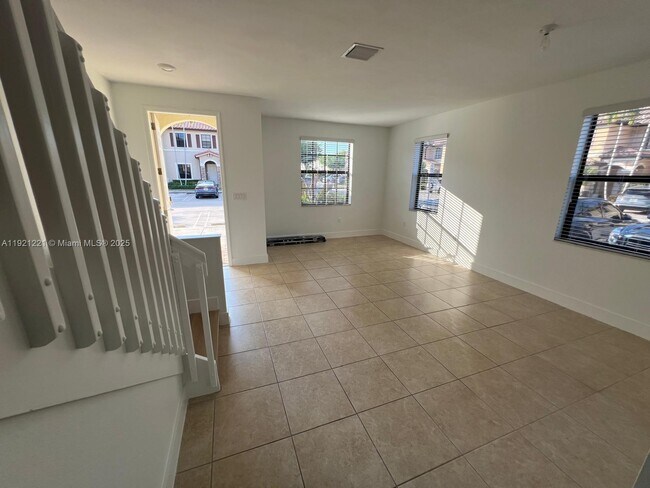 Building Photo - 9399 W 33rd Ln