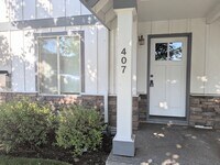 Building Photo - Gorgeous 3x2 townhouse, single-car garage, and two gas fireplaces