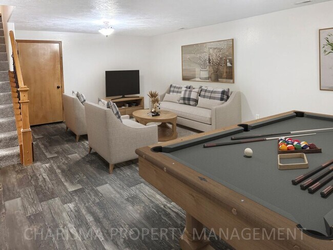Building Photo - 4 BEDROOM, 2 BATH TOWN HOME, PET FRIENDLY, AMENITY FILLED, DOUBLE ATTACHED GARAGE!