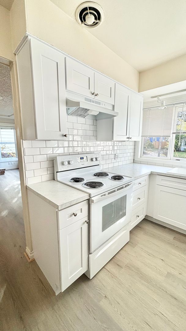 Building Photo - Recently Renovated House With Fenced Back Yard, Attached Garage, and Basement