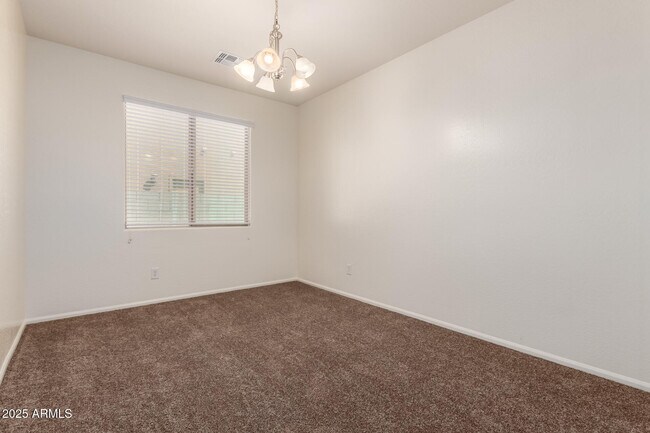 Building Photo - 9883 W Harmony Ln