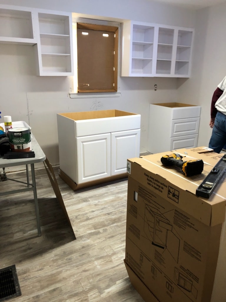 Reno update: Kitchen; highlighting floors and layout. What's next? Paint touch ups, new trim, new baseboards, new counter tops, and new doors. - 1395 Ross Ave