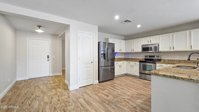 Building Photo - 25673 W Northern Lights Way