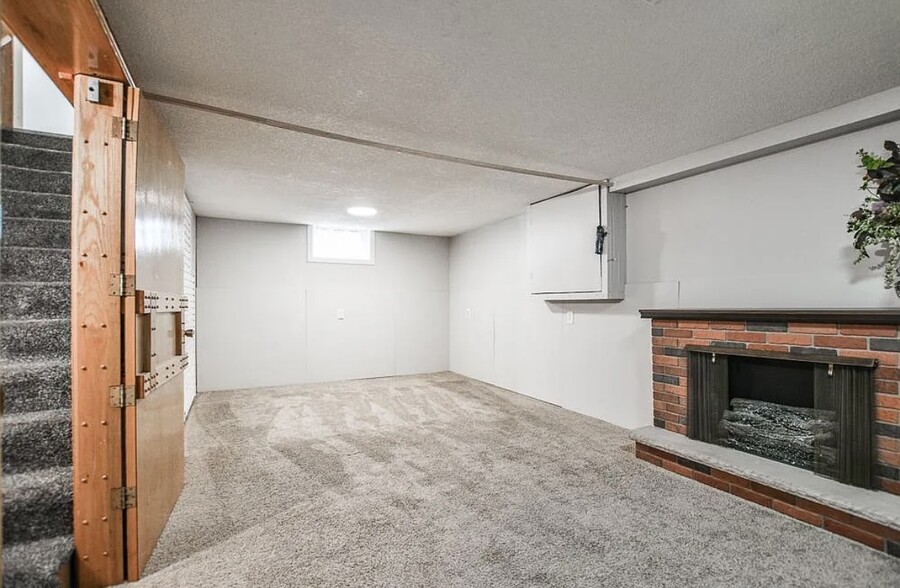 Living room downstairs. - 5609 Bryant Ave N