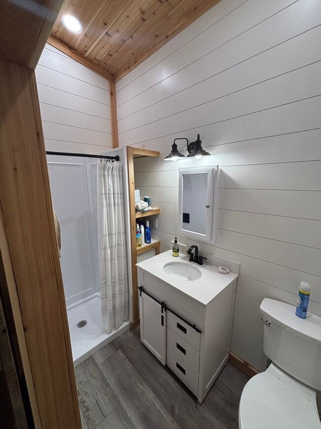 Building Photo - Cozy, Modern Tiny Home with Wrap-Around Po...