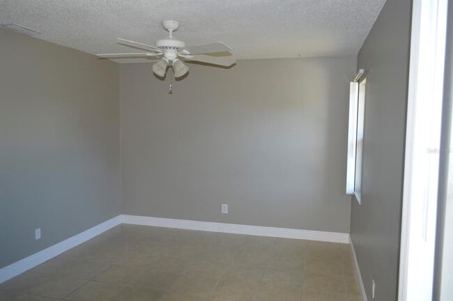 Building Photo - 6525 Manila Palm Way