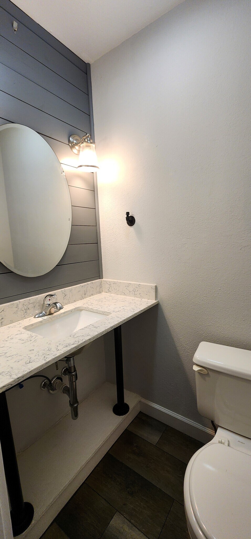 Half bath main level - 211 One Way St