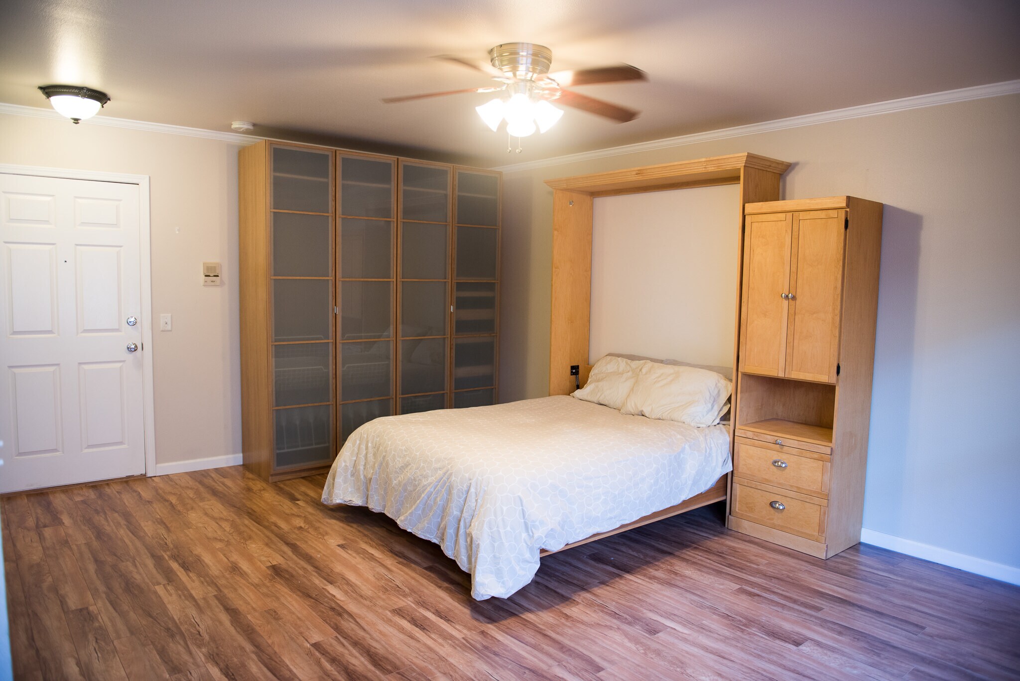 Murphy bed open in main room - 701 NE 28th Ave