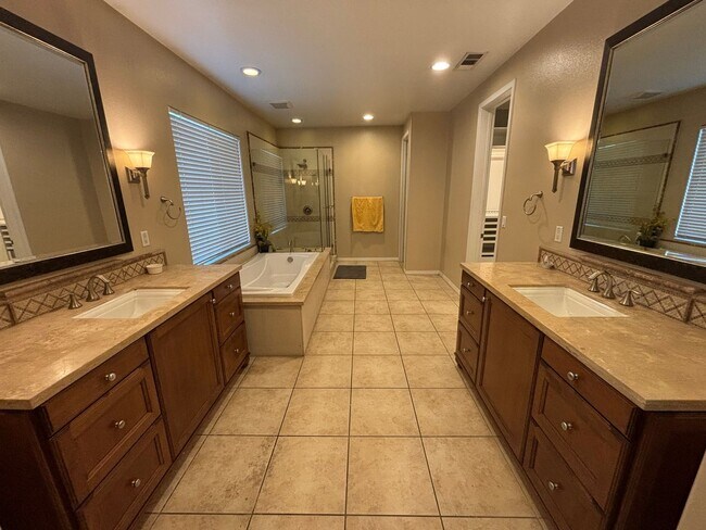 Building Photo - Short Term Lease - Grand 4-Bedroom Home with Entertainer's Yard in Gated River Village!