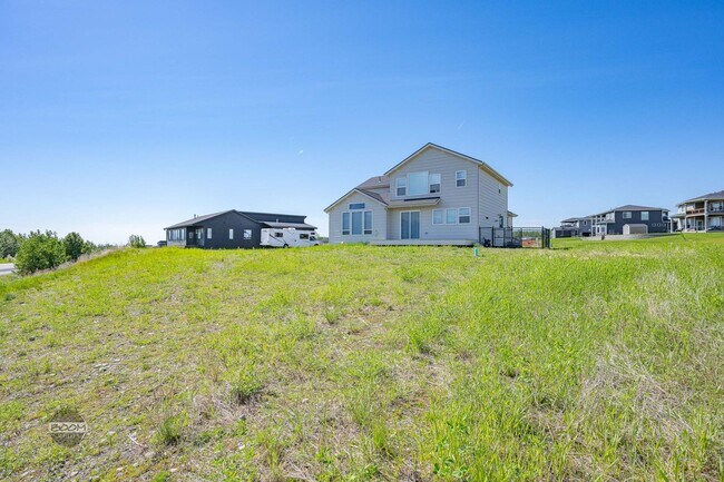 Building Photo - Premium 4BR Rental in The Ranch | Stunning Mountain Views | Easy Community Location | Automatic G...