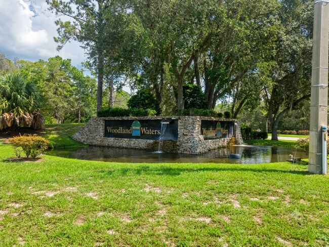 Building Photo - 10300 Woodland Waters Blvd