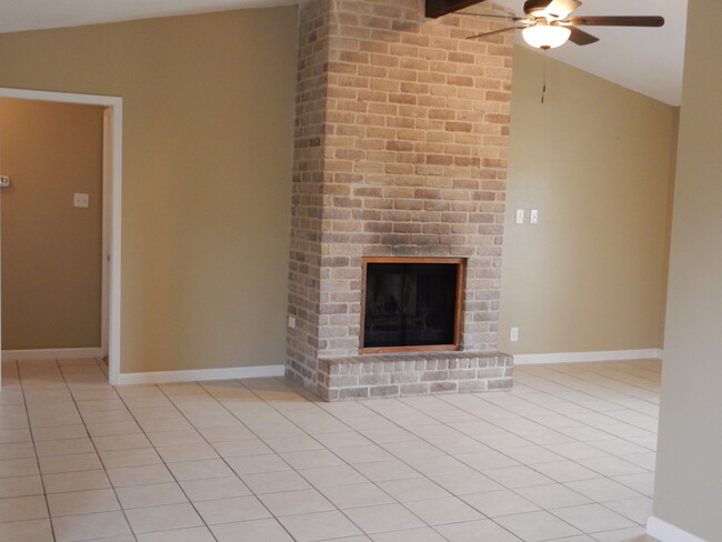 Fireplace view - 12307 shadyview dr