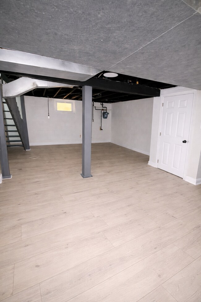 Building Photo - Renovated Home with Modern Kitchen, Basement & Natural Light