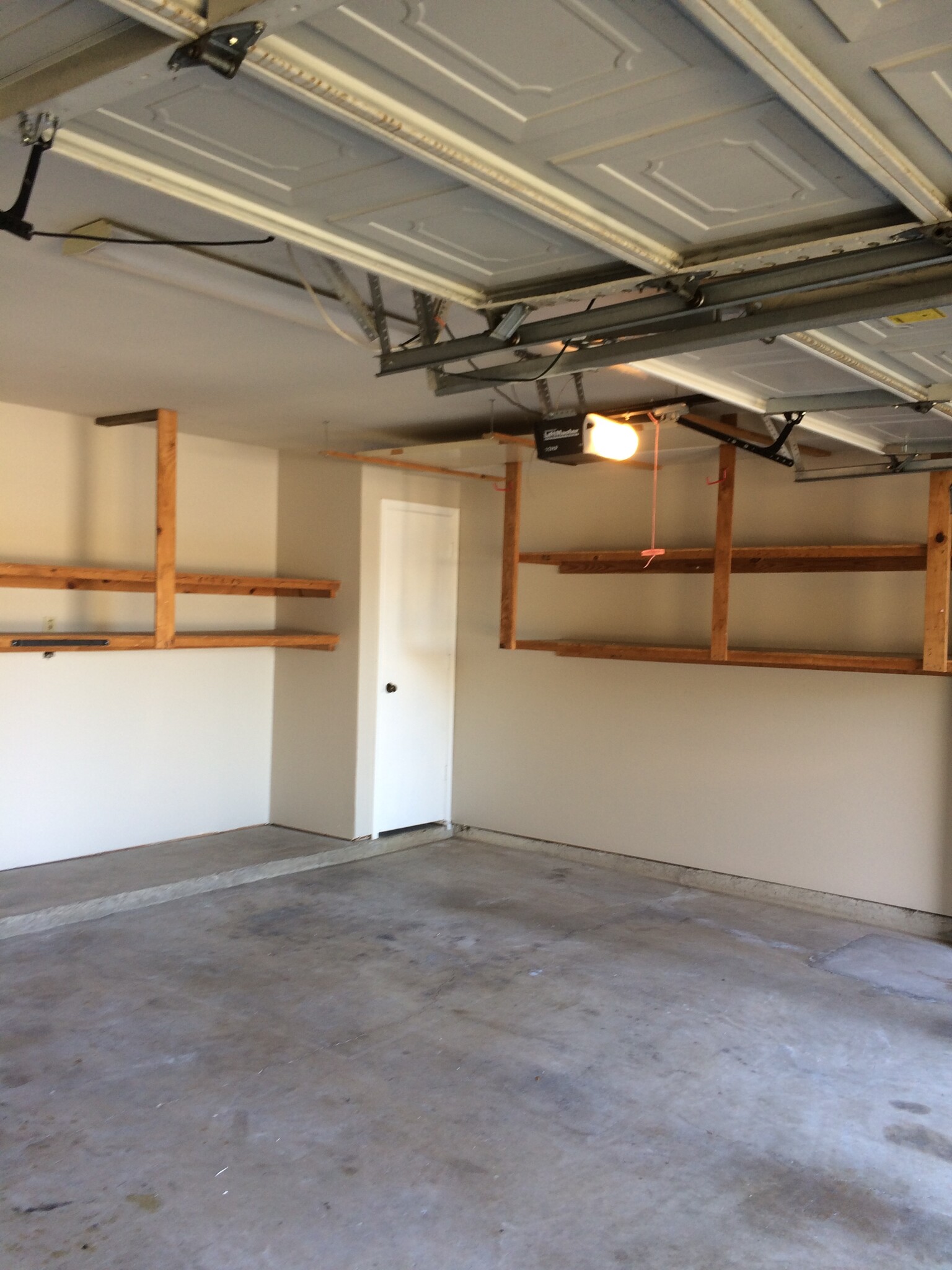 Garage with extra shelving/storage - 1205 W Hudgins St