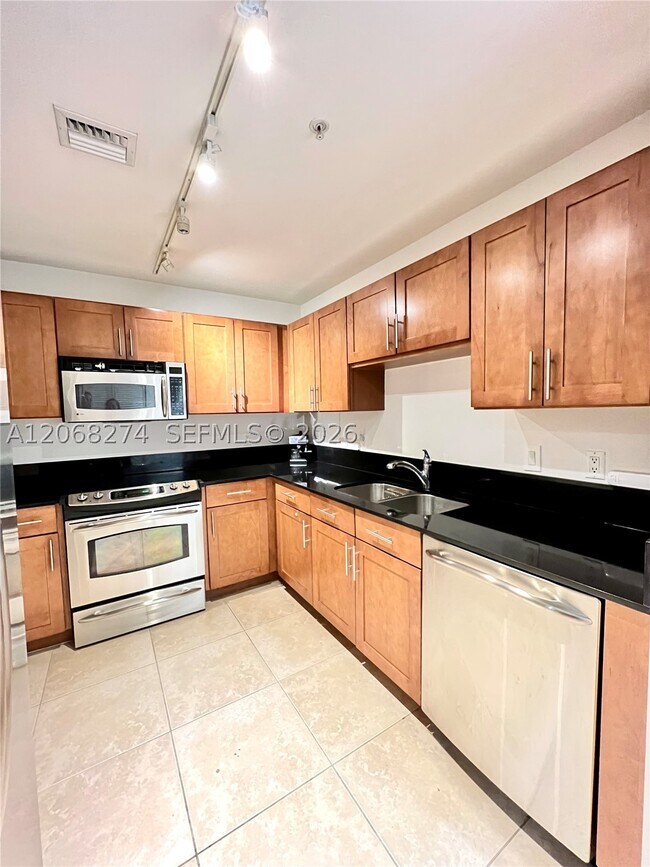 Building Photo - 8390 SW 72nd Ct