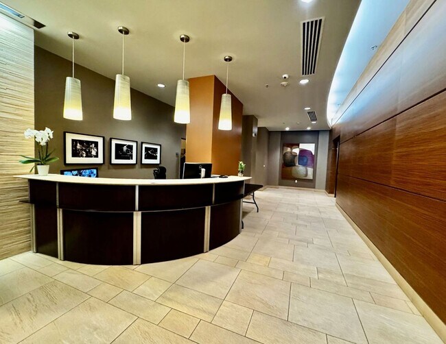 Building Photo - Corner Light. City Energy. Zero Compromise.