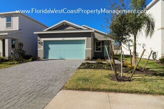 Building Photo - OUSTANDING SEMI FENCED! 3 BEDROOM/2 BATH HOME IN EAVES BEND! ARTISAN LAKES PALMETTO!