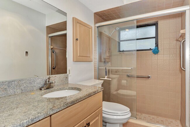 Building Photo - BEAUTIFUL 2 BEDROOM 2 BATHROOM + A DEN VILLA WITH GORGEOUS LAKE VIEWS!