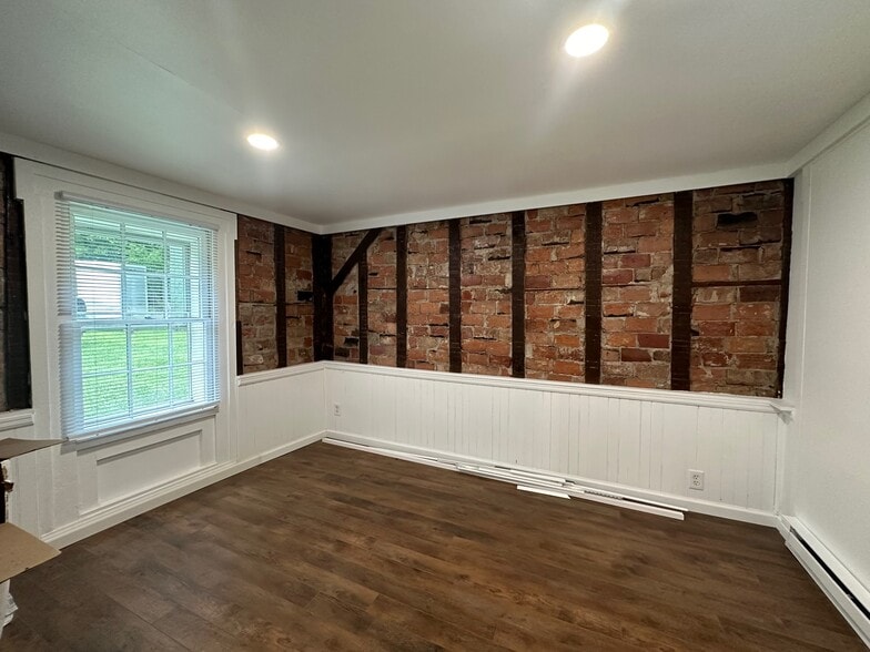 Bedroom 1 - exposed brick - 108 Franklin St