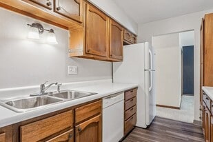 Building Photo - Whispering Meadows Condominiums
