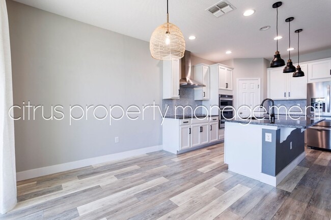 Building Photo - Stunning Double Waterfront 4/3 Home with Dock and Electric Boat Lift